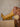 Faux leather boots with round toe, side zipper, and low heel.