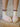 Step By Step Slippers, open-toe slip-on slides with faux fur upper and sturdy treaded sole.