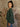 Model wearing an oversized waffle knit sweater in a soft, cozy fabric with long sleeves and a relaxed, stretchy fit.
