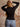 Wide-ribbed fitted mock-neck long sleeve top in a stretchy nylon-spandex fabric.