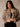 Cropped faux fur leopard coat with collar, long sleeves, and relaxed fit.