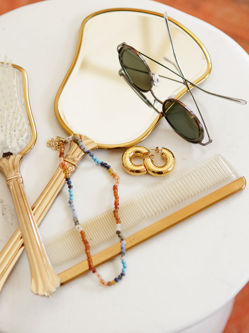Sunnies, earrings, and necklace.