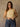 Sleeveless high neck top with shimmer threading, seamless construction, normal length, and ultra-stretchy fit.