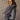 Minnie Furry Jacket, cropped with collared neckline, faux fur collar and cuffs, snap button closure, 16” shoulder to hem, 25” sleeves.