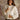 Helena Fuzzy Coat with round neck, long sleeves, hook & eye closures, front patch pockets, faux fur exterior, lined shell, and normal length.