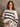 Charee Striped Sweater with crew neck, long sleeves, ribbed trim, knit fabric, striped print, lightweight, and relaxed fit.