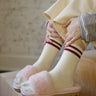 Step By Step Slippers, open-toe slip-on slides with faux fur upper and sturdy treaded sole.
