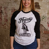 Lightweight raglan long sleeve graphic tee with Howdy print and relaxed fit in 100% cotton.