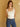 Becca Square Neck Tank with square neckline, side ruching, bra-friendly straps, fitted style, and built-in bra lining.