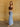 Show Me Love Flare Jeans, mid rise denim with button and zipper closure, belt loops, 4-pocket design, pleated detailing, and relaxed flare silhouette.