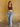 Show Me Love Flare Jeans, mid rise denim with button and zipper closure, belt loops, 4-pocket design, pleated detailing, and relaxed flare silhouette.
