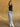 Stay Focused Barrel Jeans, mid rise denim with button and zipper closure, belt loops, 5-pocket design, exposed stitching, cuffed hem, and barrel silhouette.