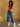 Future Tripping Wide Leg Jeans, high rise denim with button and zipper closure, belt loops, large patch pockets, cropped length, and wide leg style.