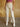 Zaya Jeans, high rise leopard print denim with zipper and button closure, belt loops, back pockets only, slim wide leg fit, cropped length, and raw hem.