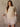 Long sleeve oversized rib knit sweater with ribbed trim, side slits, heavyweight fabric, and stretchy fit.