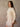 Long sleeve oversized rib knit sweater with ribbed trim, side slits, heavyweight fabric, and stretchy fit.