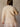 Long sleeve oversized rib knit sweater with ribbed trim, side slits, heavyweight fabric, and stretchy fit.