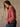Long sleeve button-up waffle knit sweater with round neck, ribbed trim, relaxed fit, and normal length.