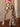 High rise cow print mini skirt with adjustable waist belt, side zipper, bodycon silhouette, unlined, and slight stretch.