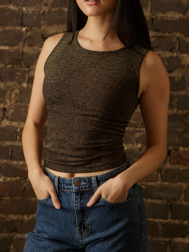 Sleeveless high neck top with shimmer threading, seamless construction, normal length, and ultra-stretchy fit.
