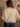 Long sleeve cropped cardigan with v-neck, button-up front, chunky rib knit, and some stretch.