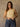 Sleeveless high neck top with shimmer threading, seamless construction, normal length, and ultra-stretchy fit.