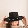 Second Fiddle Hat, faux suede hat with braided band, tassels, adjustable inner cinch, made from 100% polyester.