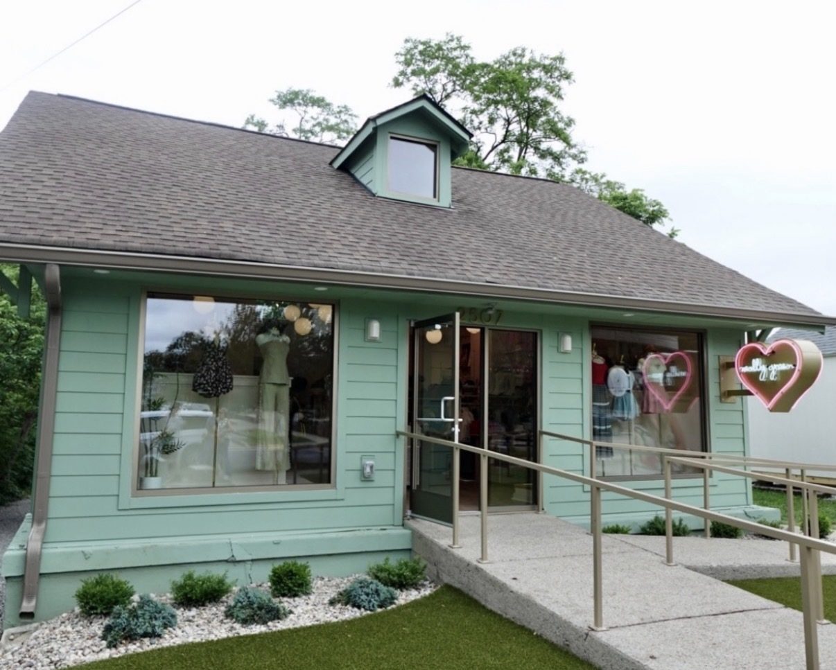Molly Green's mint-green cottage storefront on 12th Avenue South